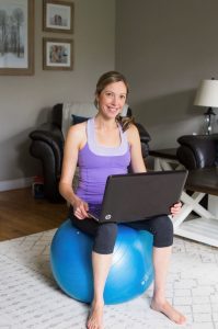 Ashley sitting on an exercise ball teaching the GLAD program